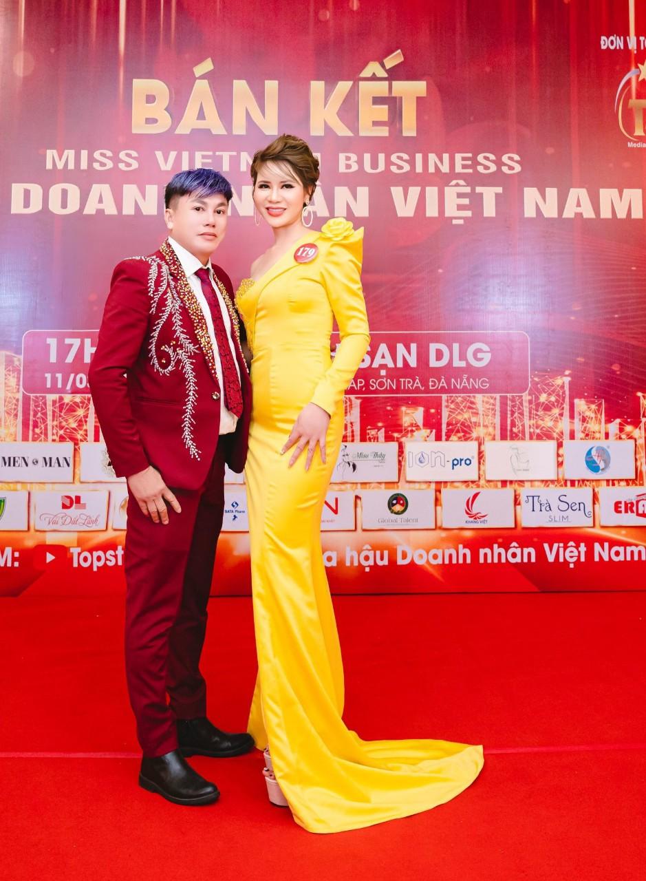 A person and person posing for a picture on a red carpetDescription automatically generated with medium confidence